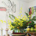 Paintings, fresh flowers and mexican ornaments in a Barden Home